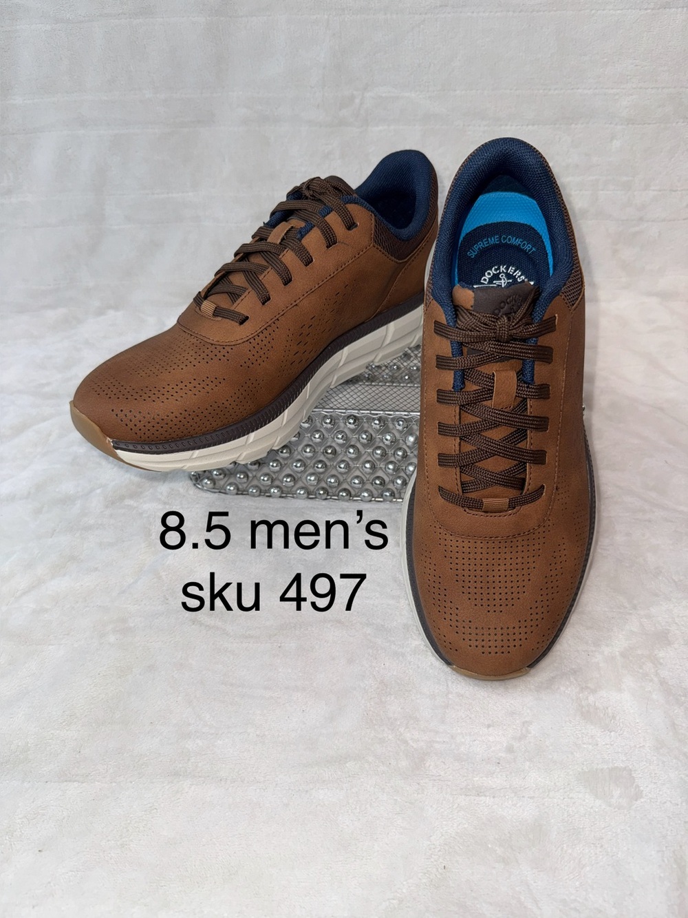 Dockers Go-2 Dark Tan Men 8.5 or an 8 men’s.  Perforated Active Rebound Sneaker